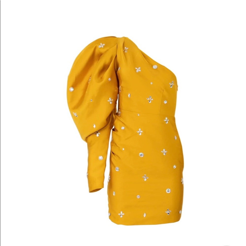Featuring an asymmetrical neckline and side zip closure